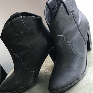 Gently worn black boots